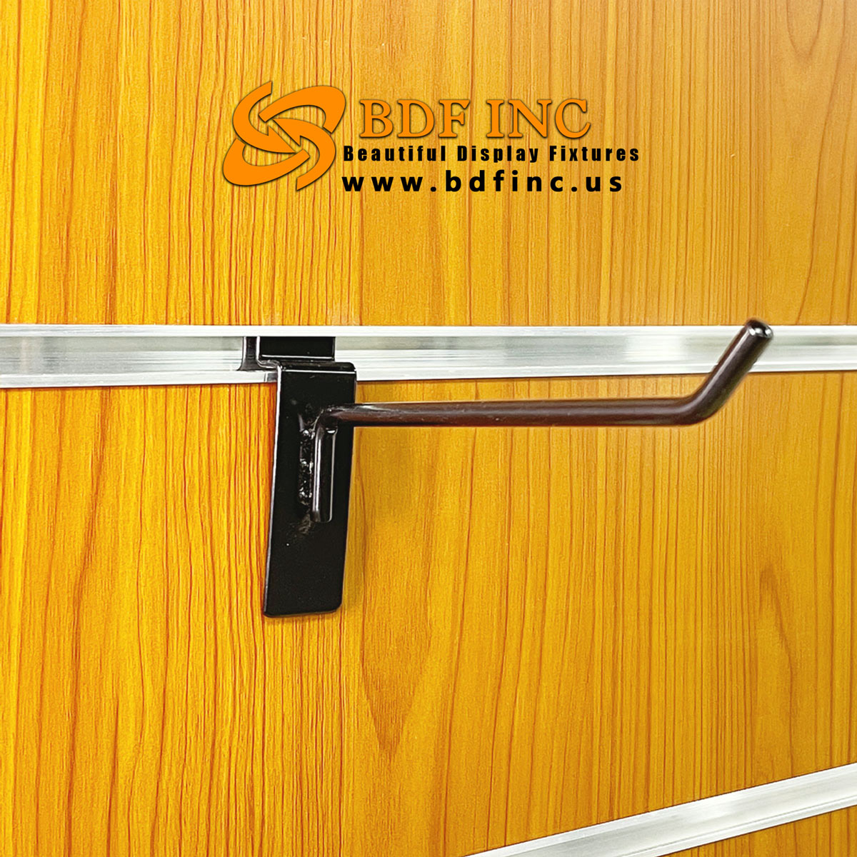 Slatwall hooks installed on slatwall panel displaying merchandise