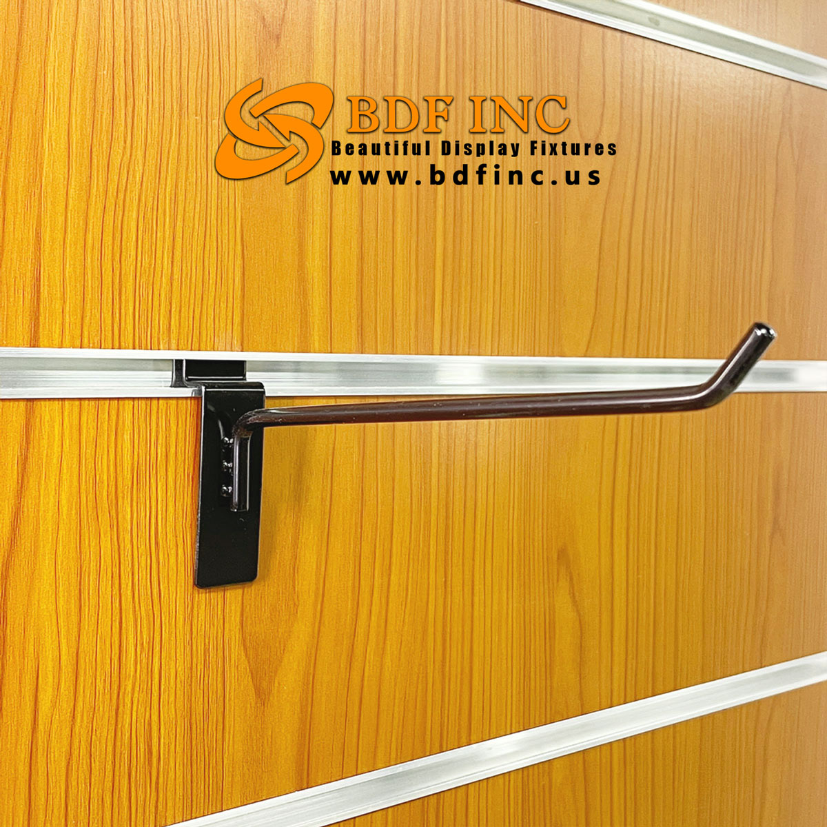 8 inch black slatwall hook displaying oversized retail products on slatwall