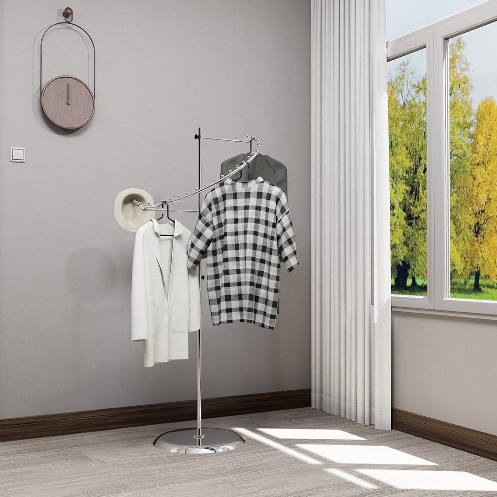 Space-efficient layout of chrome spiral clothing rack in store, showing versatile commercial display solution