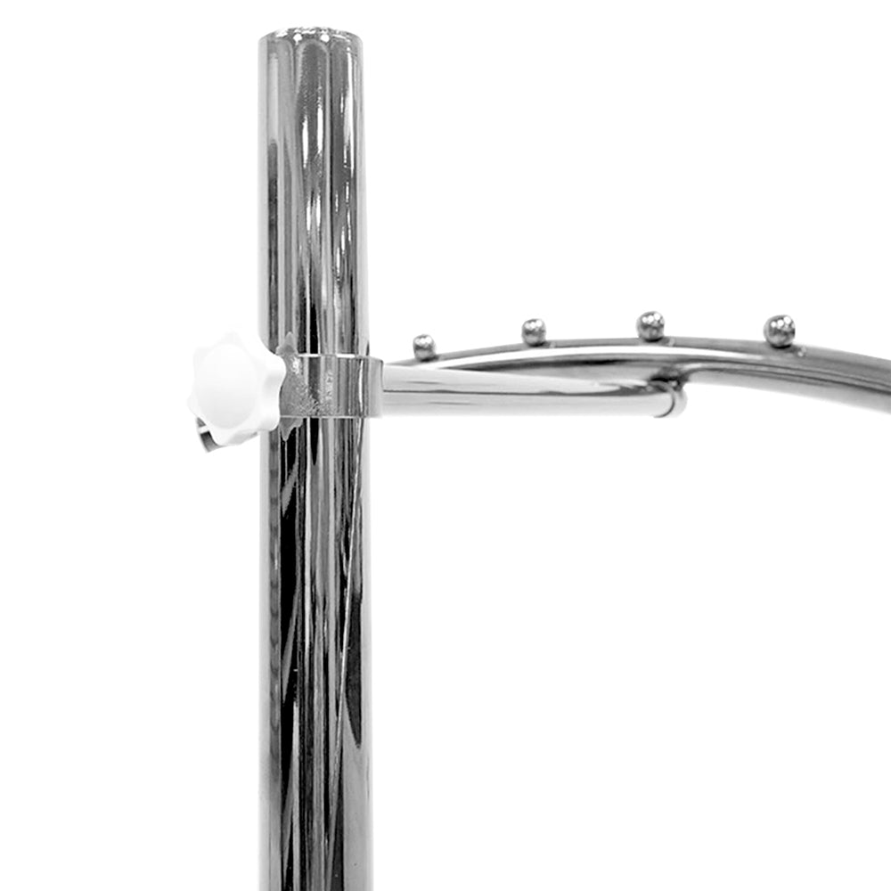 Chrome-gold spiral garment rack with 20 balls in retail store, commercial display solution for wholesale buyers