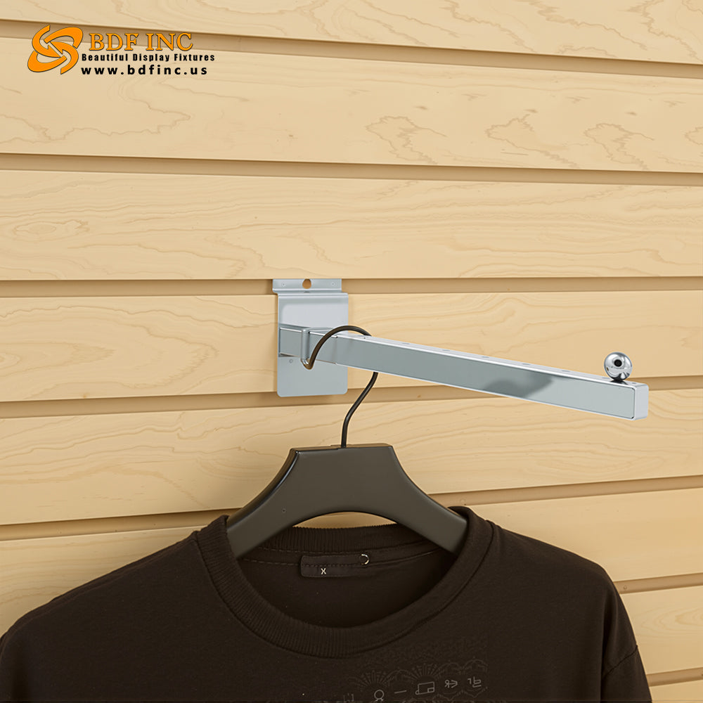 Close-up detail of chrome square tube display arm showing ball stop security