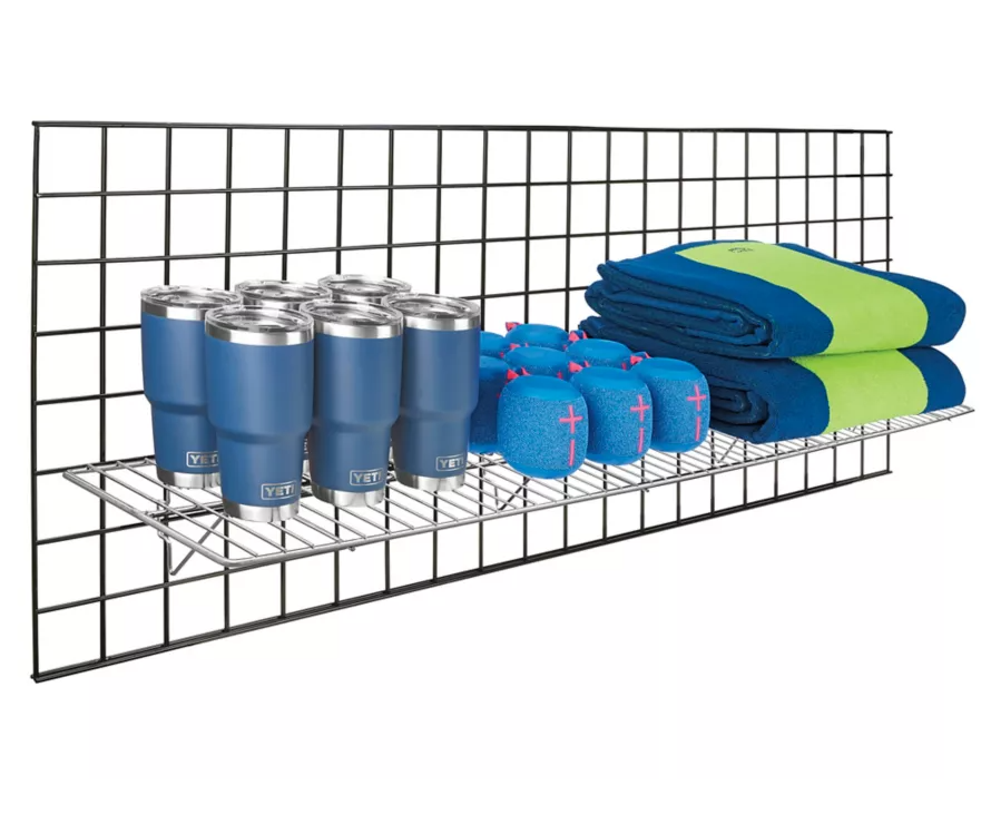 Commercial-grade 12x48 inch chrome slatwall wire shelf mounted on pegboard, ideal for automotive parts and tools display.