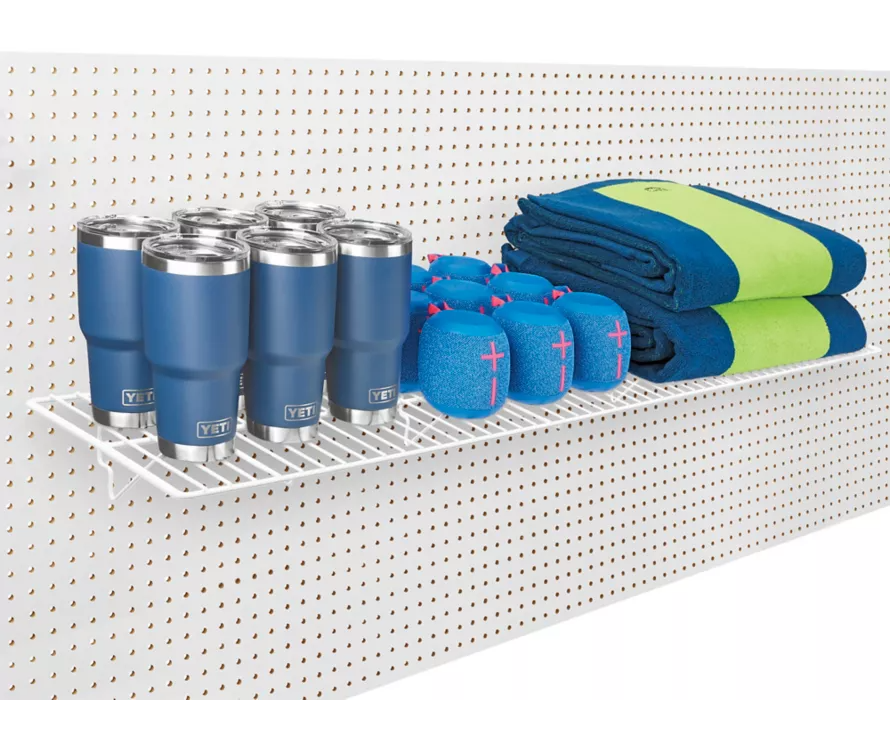 Heavy-duty 12x48 inch slatwall wire shelf installed on wire gridwall, offering bright, organized display solution for retailers