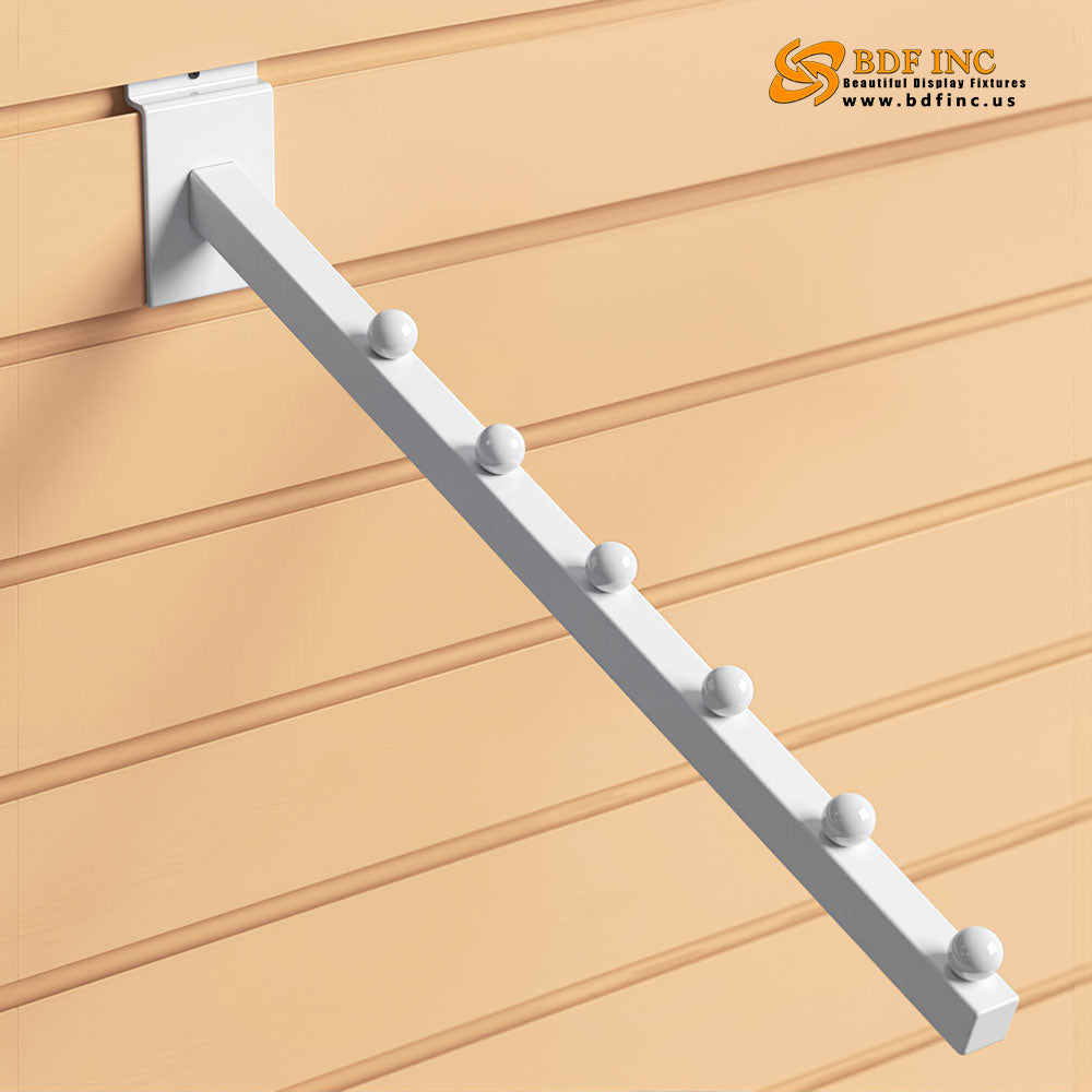 Close-up of 6 white retaining studs on slanted display arm